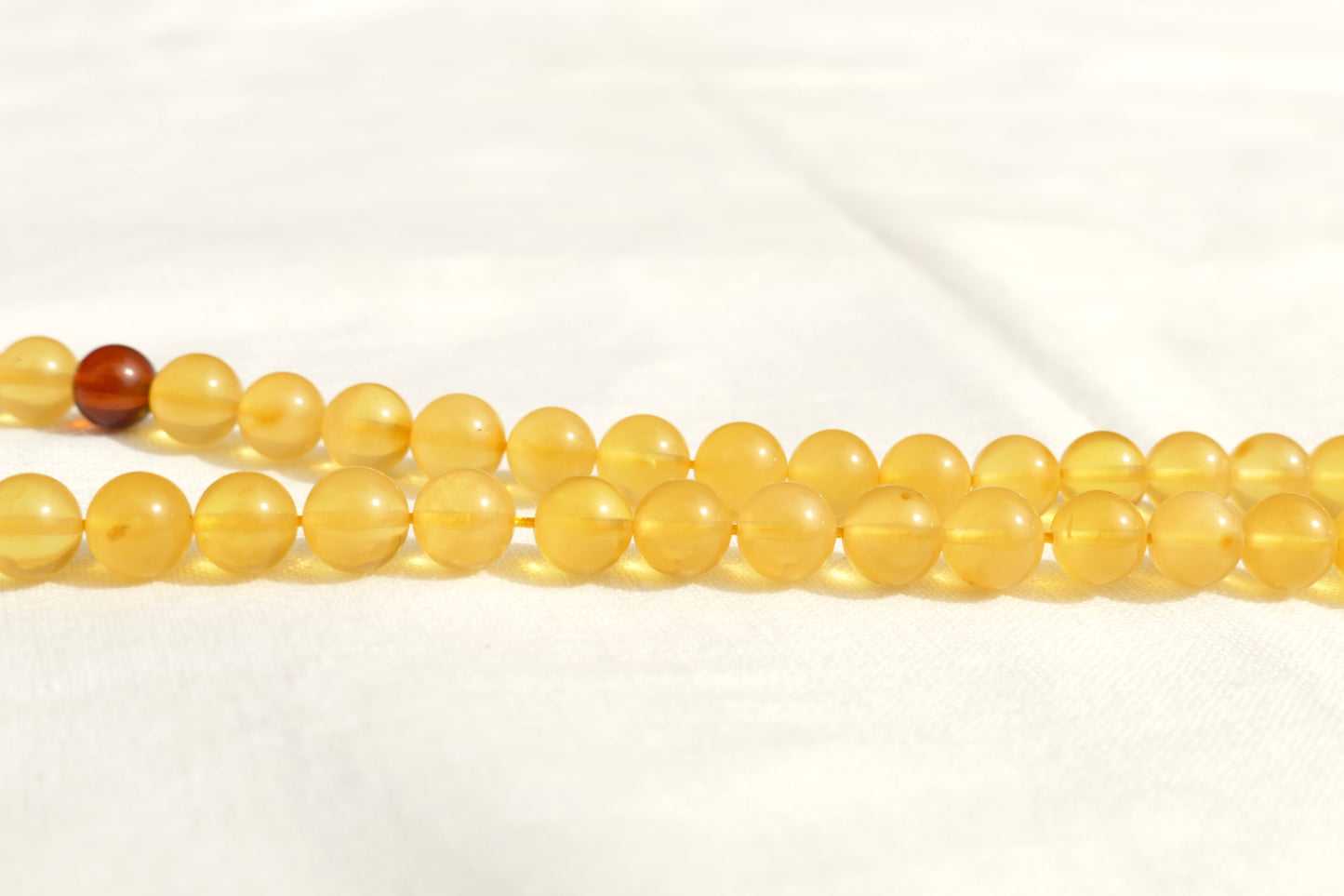108 Perlen Mala Kette aus Bernstein – Buddhistische Meditationskette & Gebetskette für Yoga und Achtsamkeit