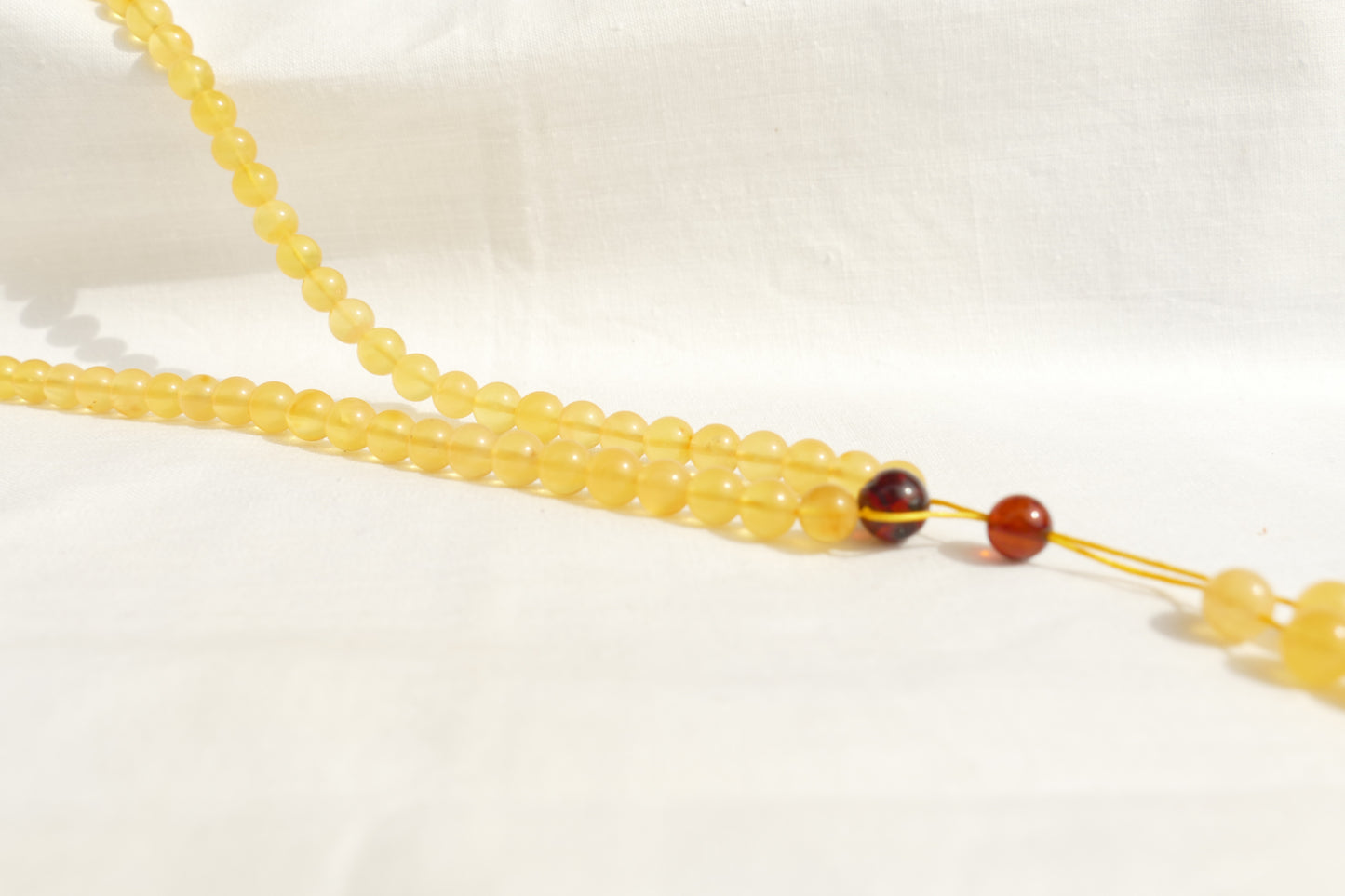 108 Perlen Mala Kette aus Bernstein – Buddhistische Meditationskette & Gebetskette für Yoga und Achtsamkeit
